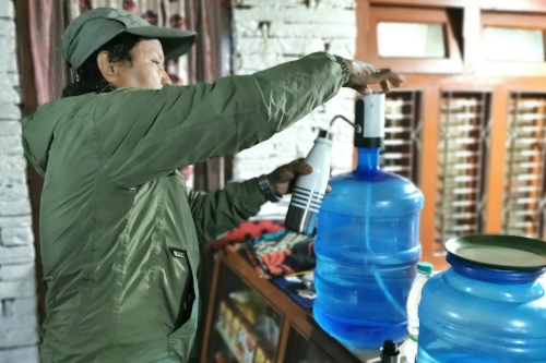 trekking to Annapurna Base Camp, drinking water