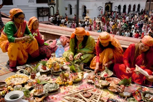 Attractions in Kathmandu, 
People gather at the open area to make offerings and Puja)\