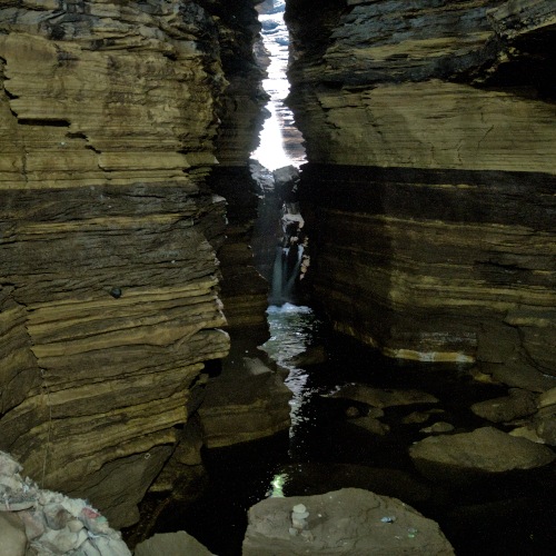 A beautiful waterfall that flows through the Gupteshwor Mahadev Cave
, coming from Devi's Falls. 