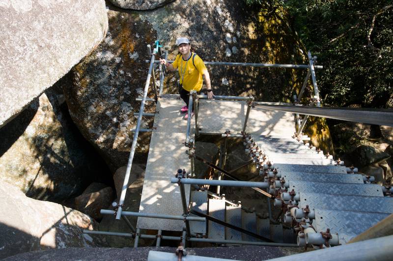 Metal stairs are being installed to reach to the top